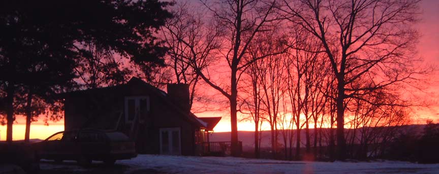 A spectacular sunrise - another beautiful
view from Sky Chalet Mountain Top Lodge Bed and Breakfast Cabin Inn in the Shenandoah Valley of VA